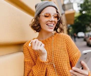 A woman uses a mobile phone
